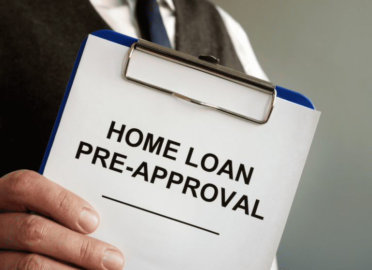 Close-up of a clipboard with the words “Home Loan Pre-Approval.”