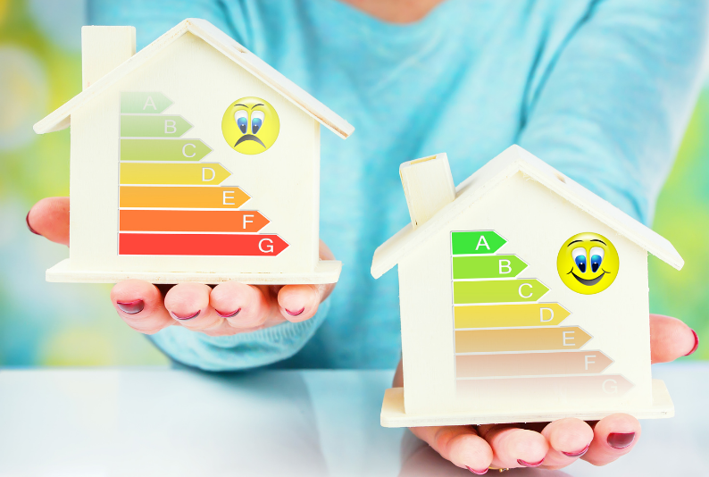 Two houses showing different energy or cost ratings