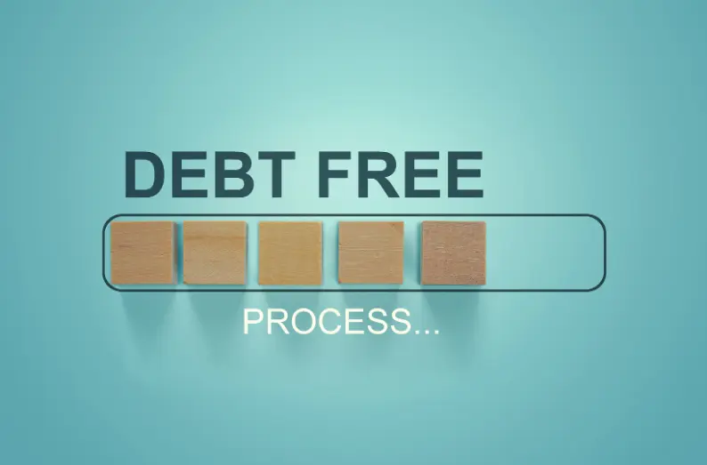 Progress bar with wooden blocks under the words “Debt Free” and “Process...” on a blue background.