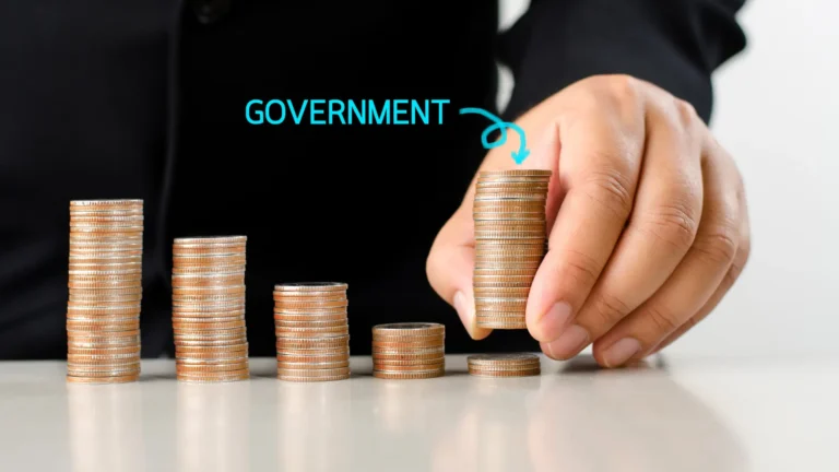 Hand stacking coins with the word “Government” above, symbolising government financial assistance and grants for first home buyers in NSW.