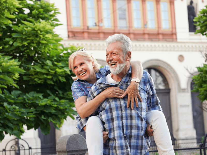Retired couple enjoying life after investing in property through an SMSF